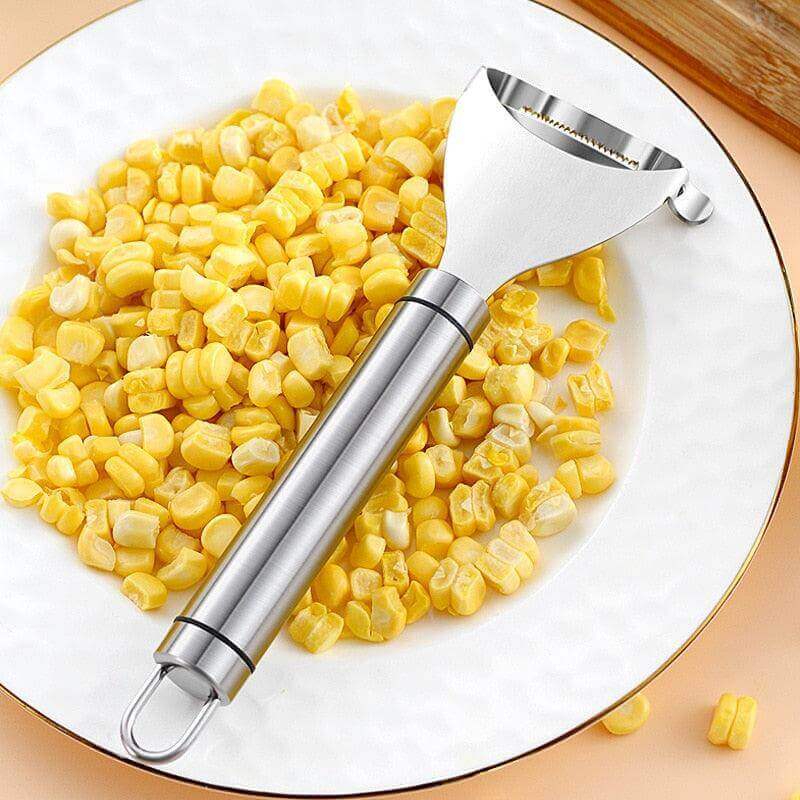 inoxydable - épis de maïs - corn - acier - inox - couteau - tranche - corn - épis - blé d'inde - épluché - coupé - épluche - égrainé